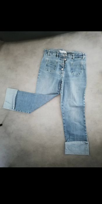 Pantalon en jean fin 3/4 à revers cousu