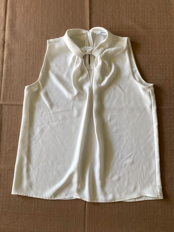 Haut blanc sans manche élégant M
