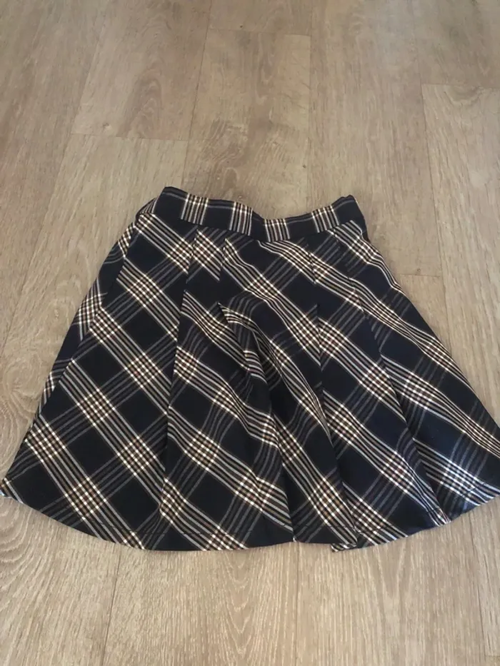 Jupe Gemo taille 10 ans état 9