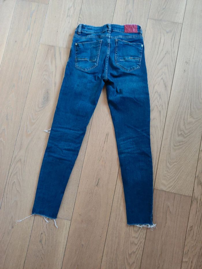 jeans troué - photo numéro 3