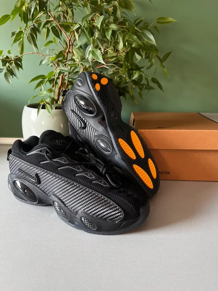 Nike × NOCTA Glide “Black / Iron Grey / University Gold” - photo numéro 2