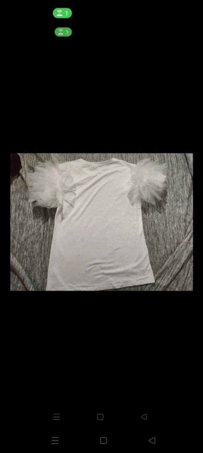 Jolie haut blanc chic 💎 S.M💎