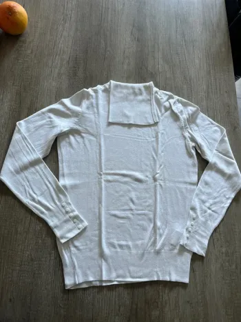 Pull col roulé