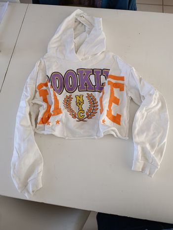 Pull court xs 14 ans