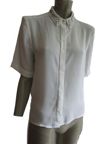 tunique blouse avec bijoux au col marque h&m taille indiquée 36 peut aller a un petit 38