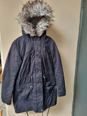 Manteau noir à tirette et boutons