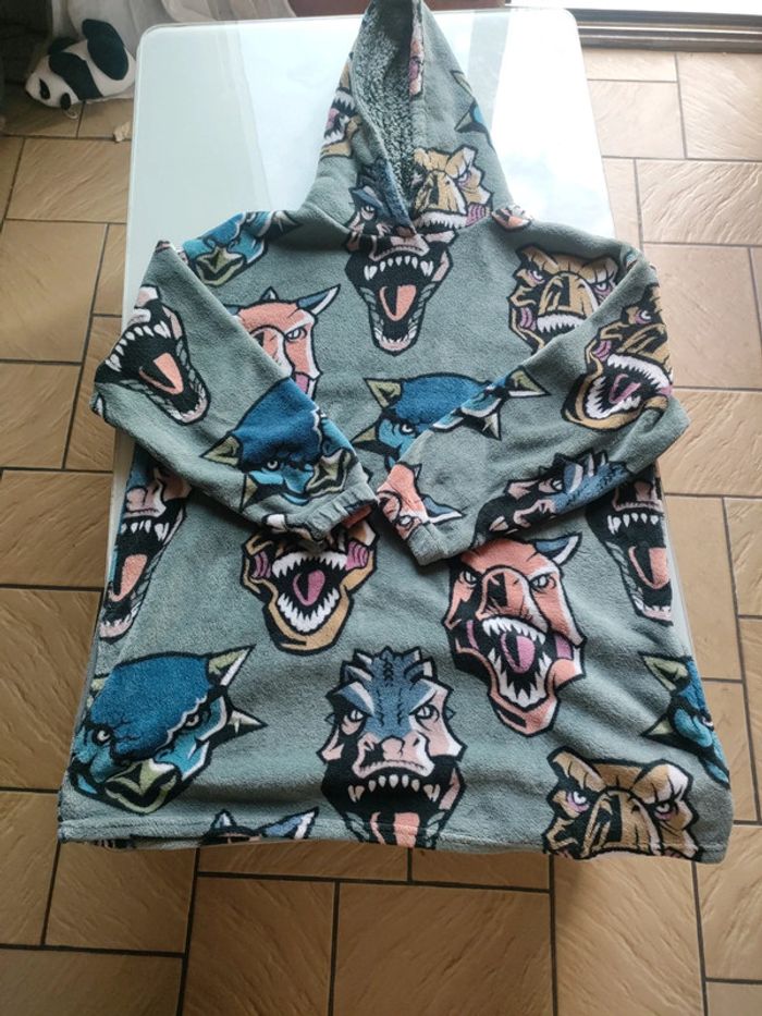 Poncho Jurassic world polaire avec capuche et poche 13-14 ans
