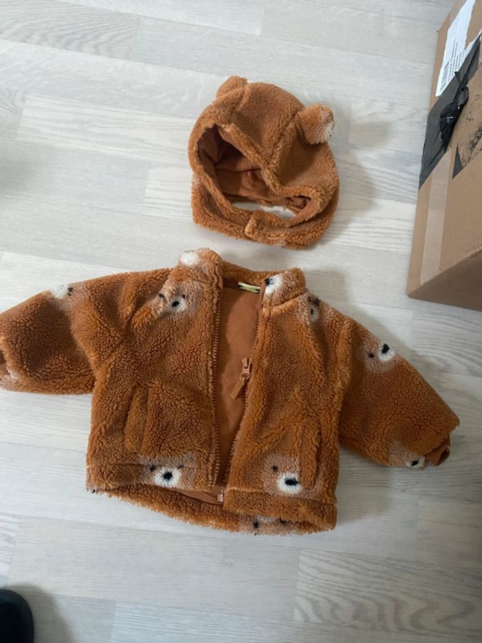 Gilet avec bonnet
