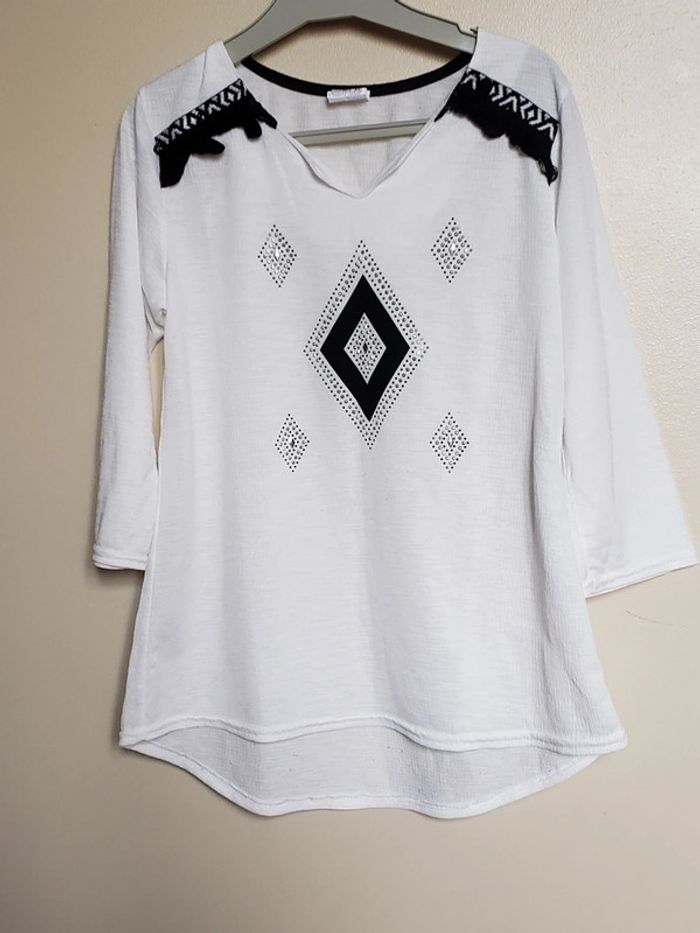 Jolie tunique blanche et noire manche 3/4 taille 12 ans