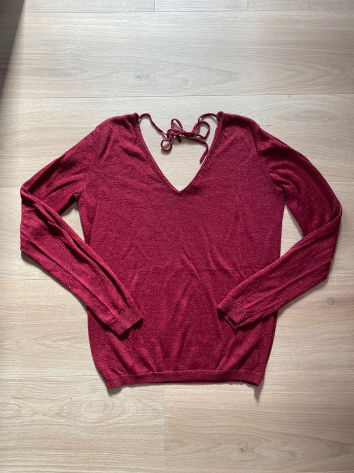 Pull dos ouvert à paillettes