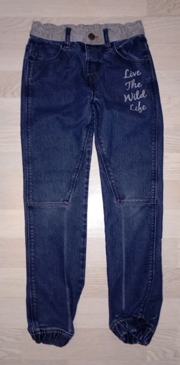 Jeans bleu denim avec bas des jambes élastiqués Tissaia 
T. 10 ans