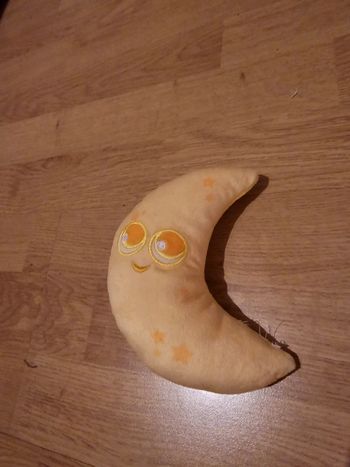 Peluche lune toy story/disney