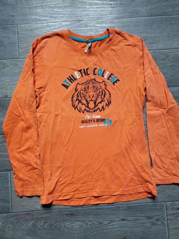 T-shirt taille 10 ans bon état Orchestra