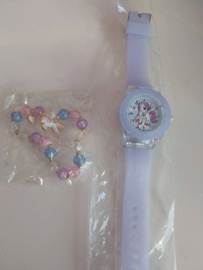 Ensemble neuf montre licorne +bracelet