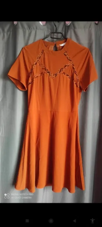 Magnifique robe neuve décolleté dos