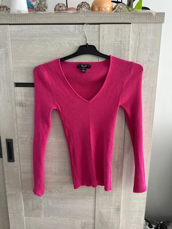 Pull col V rose taille S