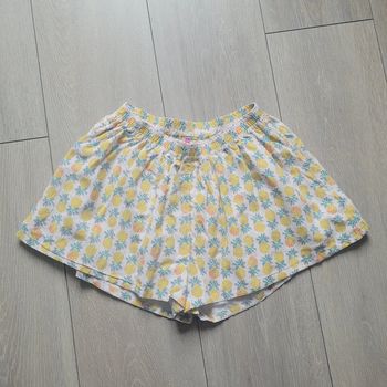 Jupe short blanc et jaune. Fille 8 ans. Marque Orchestra
