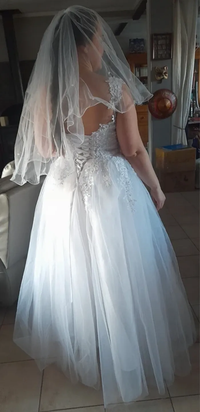Robe de mariée lacées perle - photo numéro 9