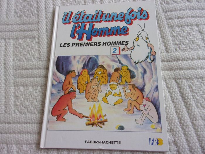 livre "il était une fois la vie - les premiers hommes"
