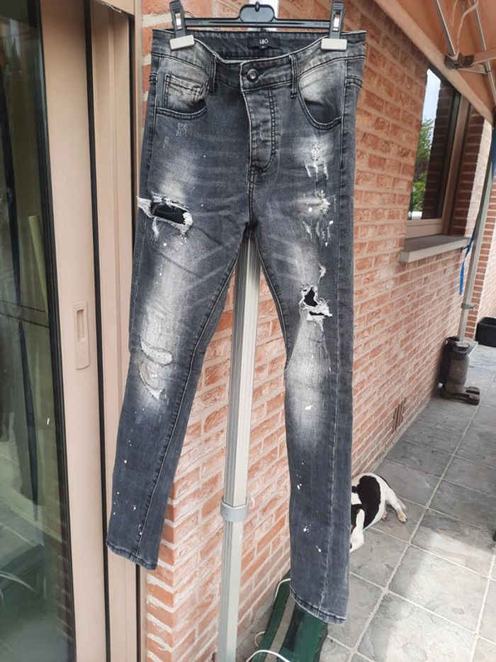 Jeans à trous homme