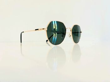 Lunette de soleil mixte dorée verres verts uvprotection catégorie 3