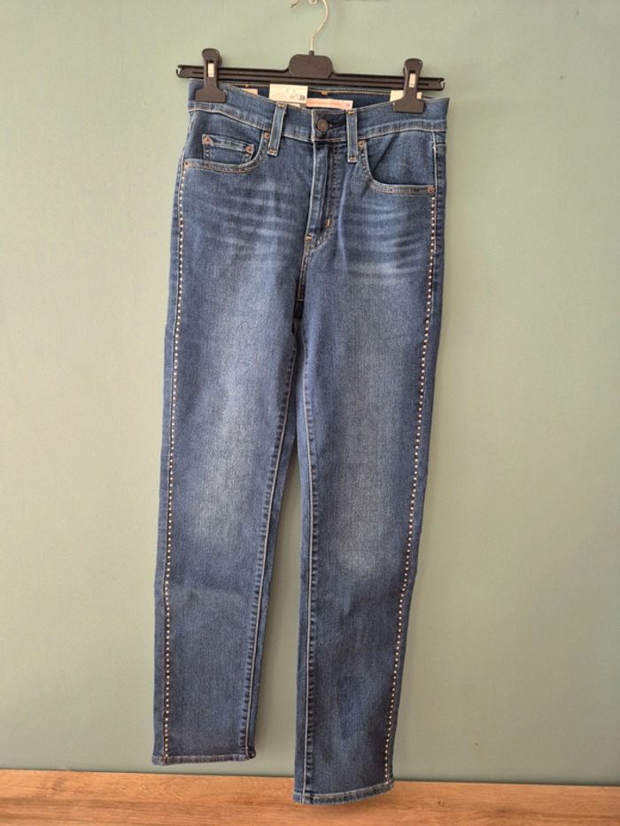 Jean slim taille haute a clous, levi's taille 36, neuf
