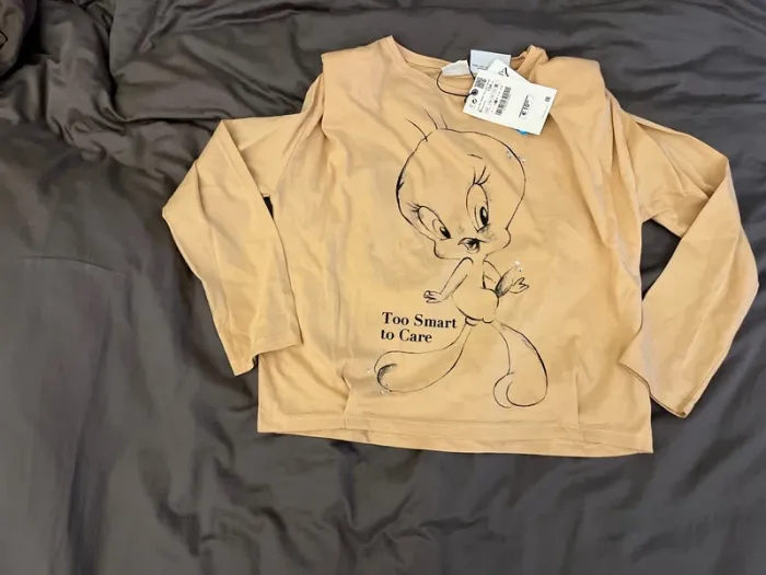 Tee shirt à épaulettes