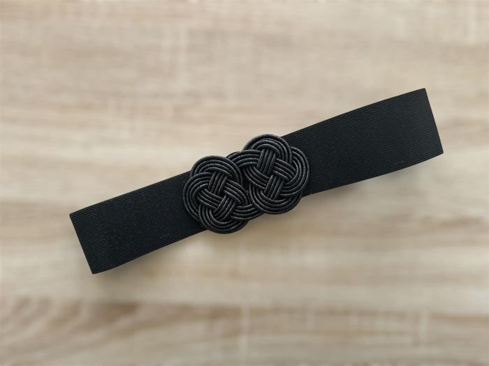 Ceinture élastique nœud noir pailleté