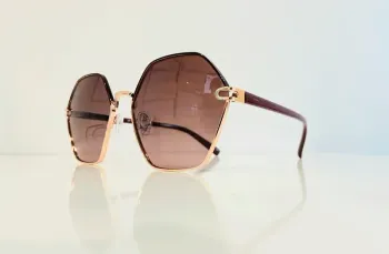 Lunette de soleil femme hexagonale Polarisée bordeaux et dorée uvprotection catégorie 2