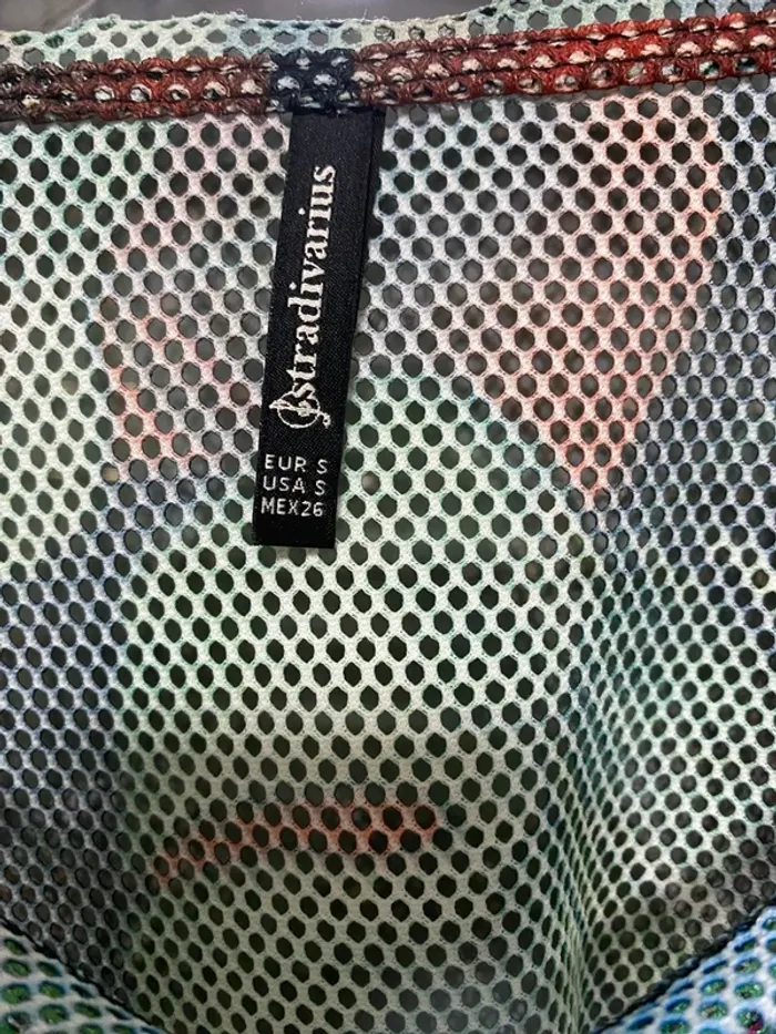 Camiseta con agujeros - photo numéro 3