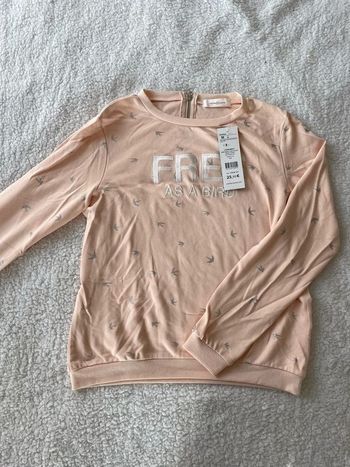 Sweat rose abricot motifs oiseaux et écritures à manches longues et fermeture éclair dos