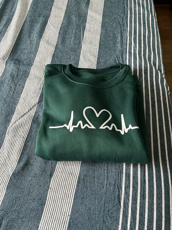 Deux pulls neufs femmes 42