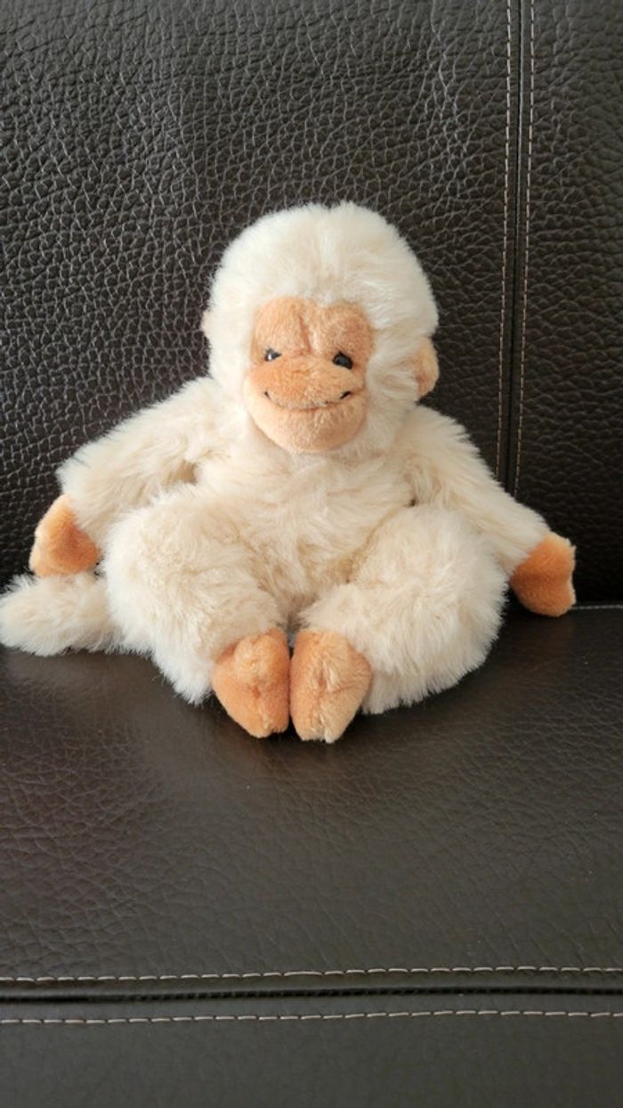Peluche singe blanc crème