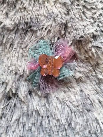 Pince papillon rose clair