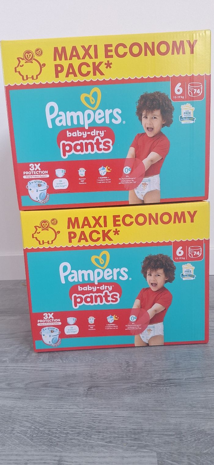 2 paquets couches pampers taille 6 pants neuf
