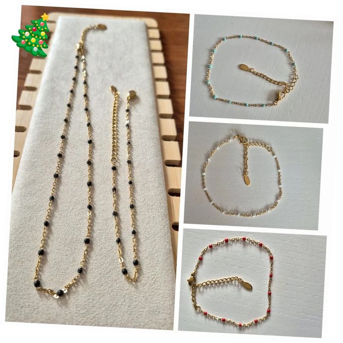 Lot de 5 bijoux : 1 collier blanc + 4 bracelets en acier inoxydable
