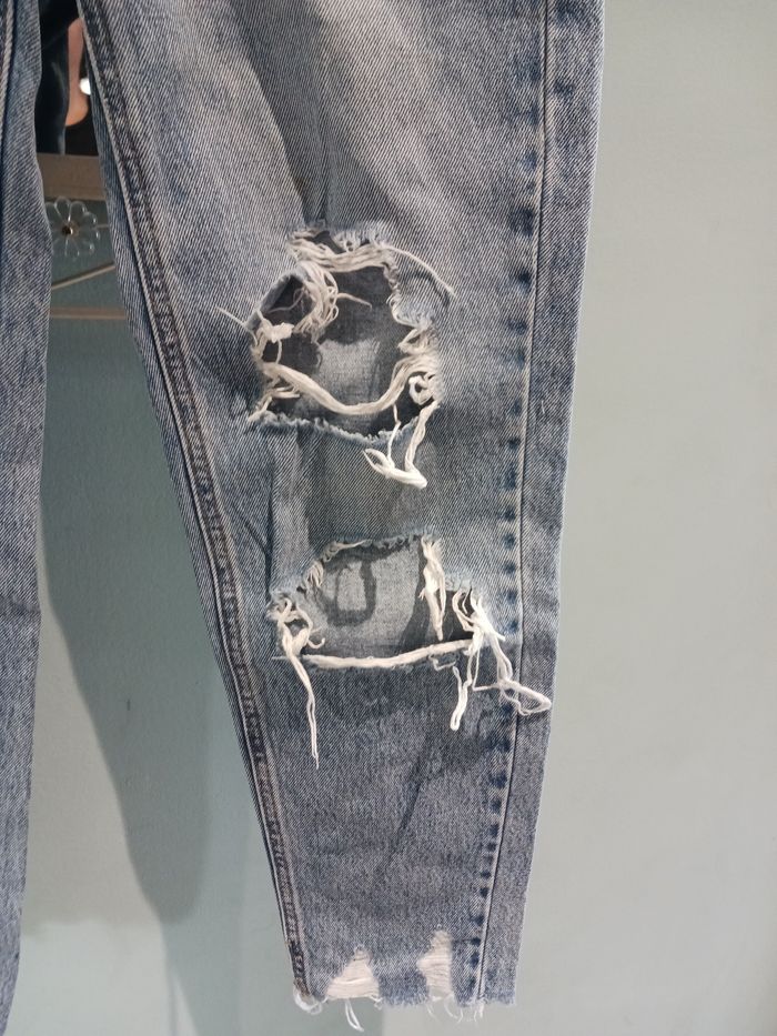 Jeans troué - photo numéro 5