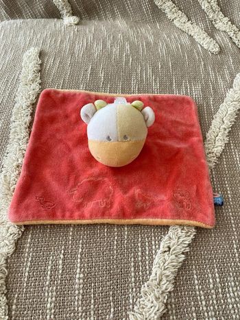 Peluche doudou plat 20cm Sucre d'Orge vache rouge et orange très bon état