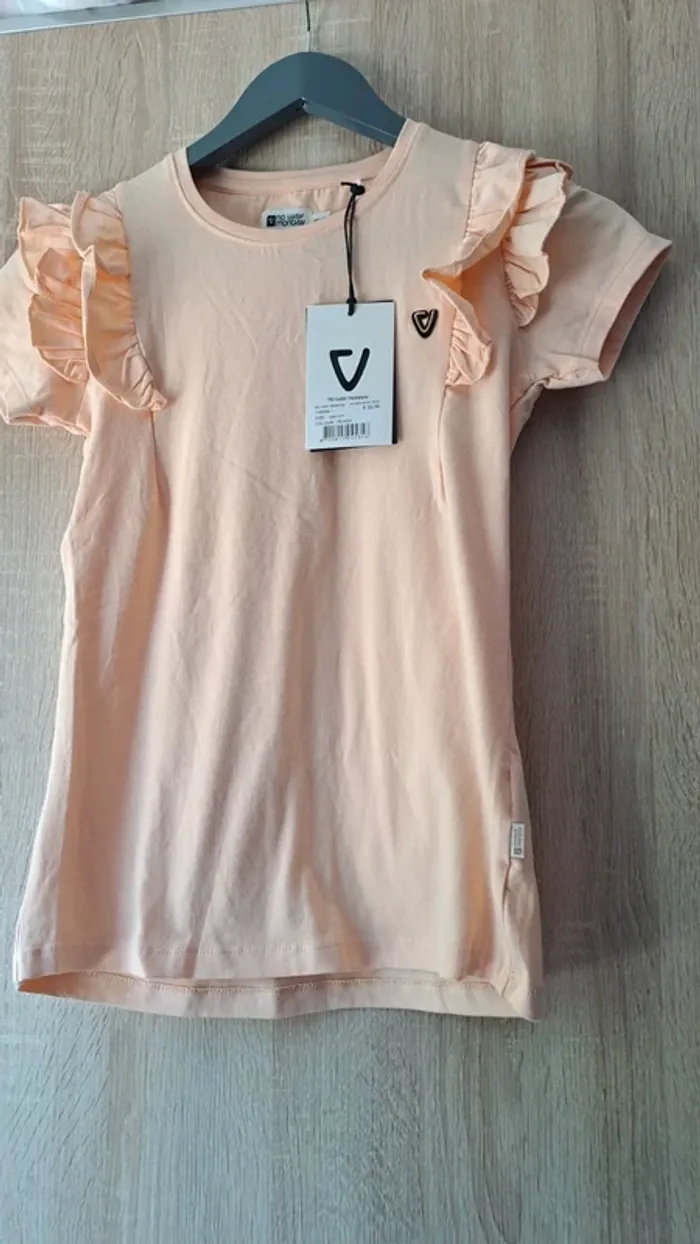 T shirt neuf taille 14 ans