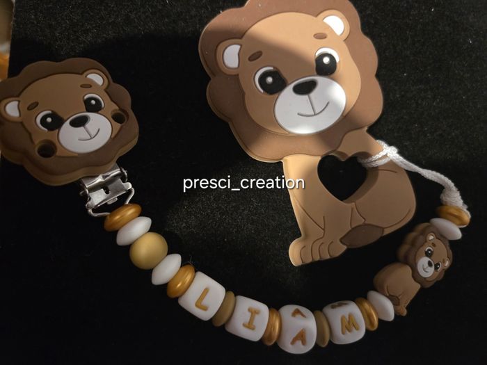 Attache anneau de dentition