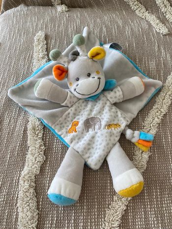 Peluche doudou plat 22cm Tex girafe vache gris bleu et blanc parfait état