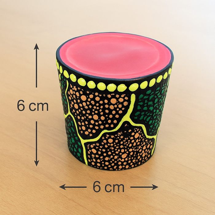 Mini corne de brume (Mini woowoozela) avec motifs aborigènes peints.