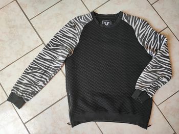 Pull taille L