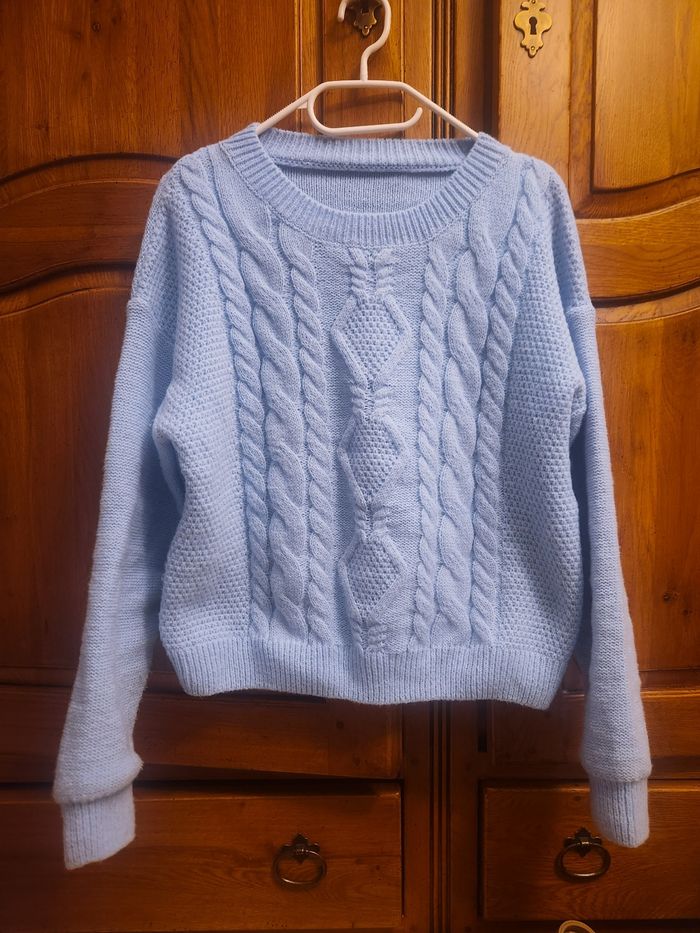 Pull torsadé femme