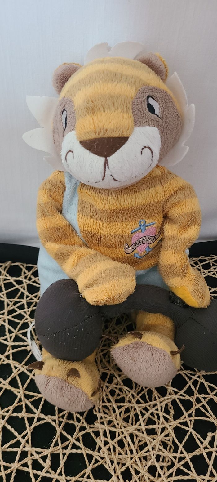 Lion Ikéa Cirque avec altère Mamma rayé orange et bleu