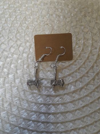 Paire de boucle d oreille artisanal hache