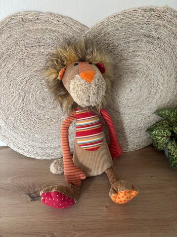 Doudou lion sweety patchwork marron rouge sigikid