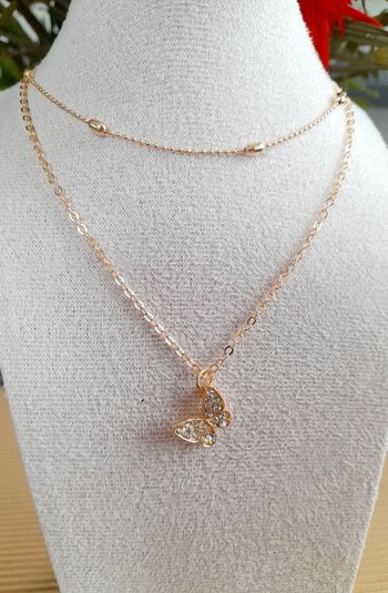 Collier double rang ras de cou papillon