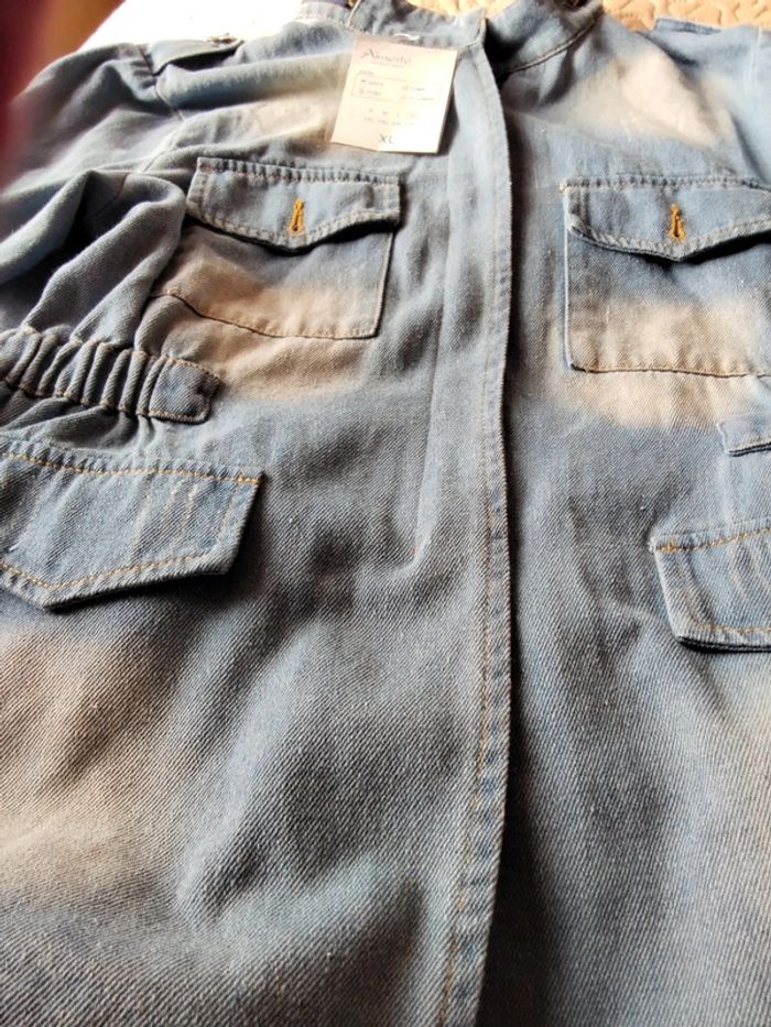 Veste femme jeans délavé . Très belle coupe. Taille marqué xl je dirais 40/42. - photo numéro 3
