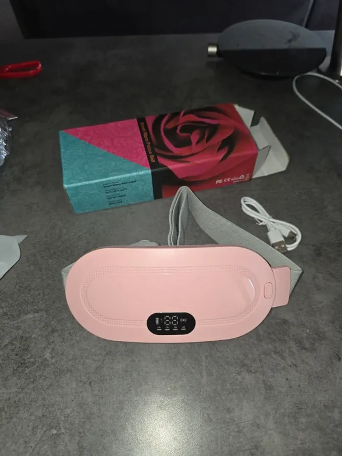 [NEUF] Ceinture menstruelle chauffante et massante rose